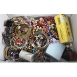A mixed lot of costume jewellery to include bangles