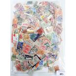 A large packet of Commonwealth stamps, no GB,