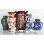 A group of vases to include a prunus ginger jar and two handled verne