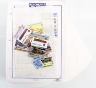 A large packet of pages of stamps with locomotives and a small bag of others
