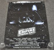 A signed Jerry Lewis poster 'The Nutty Professor' and a 1979 Star Wars poster 'The Empire Strikes