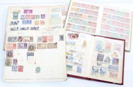 Four old stamp albums with international and British stamps