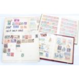 Four old stamp albums with international and British stamps