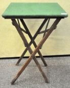 A card table in folding stand 69cmH x 46cmW x 46cmD