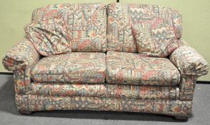 A Marks and Spencer abstract pattern upholstered two seater sofa 175cm in length