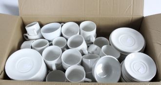 A large group of white tea and coffee ware