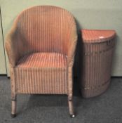 A Lloyd loom chair together with laundry baskets