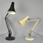 Two 20th Century Anglepoise lamps with round bases. Approx 73cm tall.