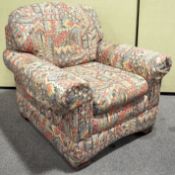An M & S club style armchair and stool