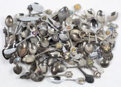 A collection of silver plated tourist spoons and others