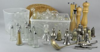 A large collection of assorted condiment wares