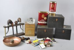A collection of smoking related items, to include pipes, a pipe rack, matches and a copper ashtray,