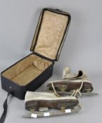 A cased pair of Dolcis ladies Ice skates. Size 6.