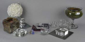 A collection of assorted glassware to include a large footed vase and other glassware.