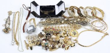 A collection of costume jewellery, to include bangles,