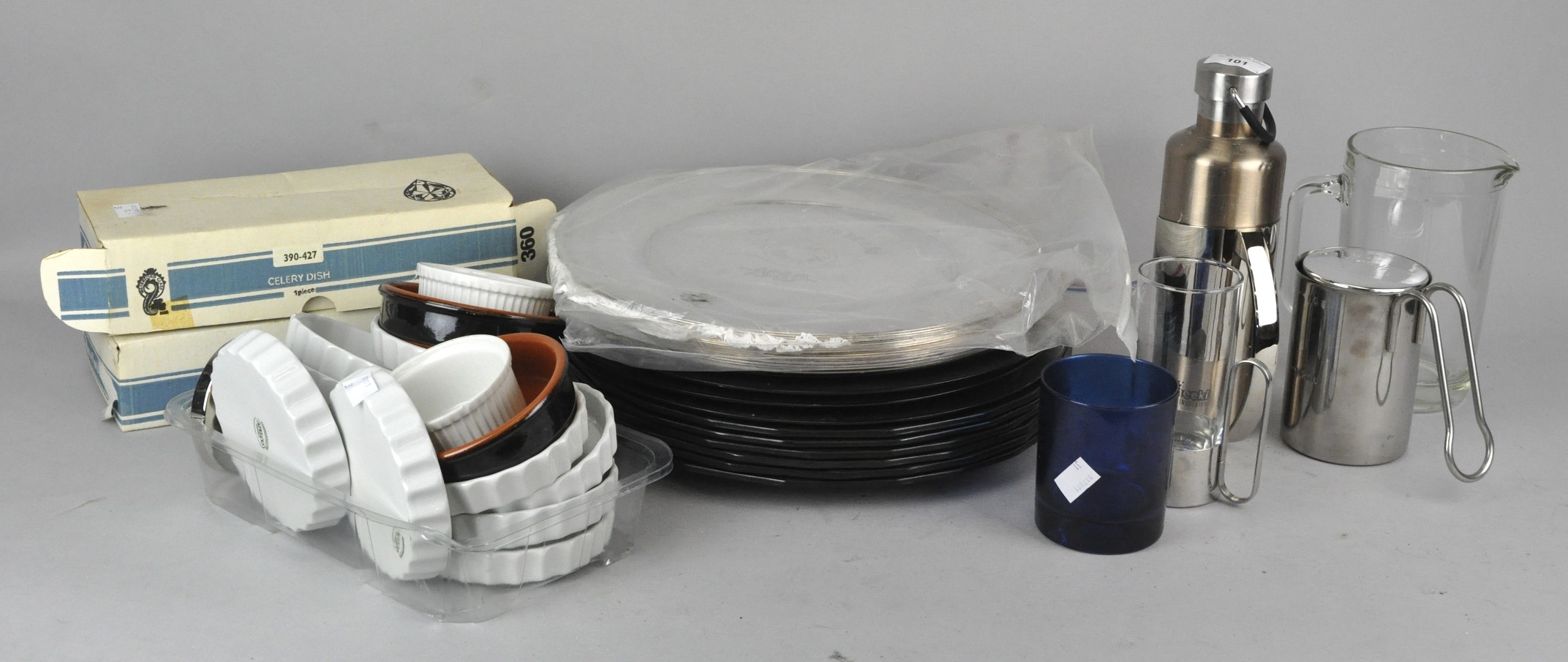 A collection of kitchenware, including plates,