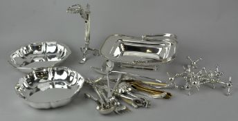 A quantity of silver plate, to include a wine bottle holder, knife rests and other items.