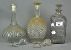 Three period cut glass decanters with stoppers. Tallest measures; 28cm.