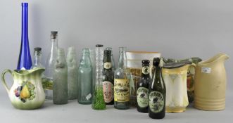 A collection of assorted bottles, jugs and flower pots. Tallest measures; 42cm.
