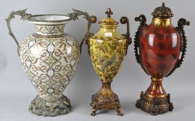 A Florentine style baluster pottery urn, decorated with scrolling foliates,