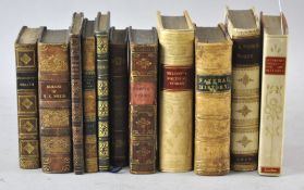 A group of leather bound volumes,