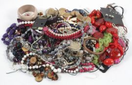 A collection of costume jewellery to include necklaces and bangles,