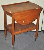 A mahogany drop leaf tea trolley,