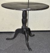 A vintage ebonised oak round pedestal table. Measures; 70cm.