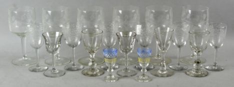 A collection of assorted glassware to include etched glass and painted glass.