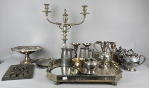 A large collection of assorted silver plate to include; gallery tray, candelabra,