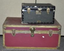 A large vintage brass bound trunk along with another. Largest measures; 39cm x 89cm x 50cm.
