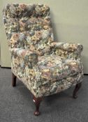 A late 20th Century floral upholstered button back armchair 98cm x 68cm