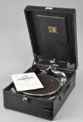 A HMV model 102 78rpm portable gramophone.