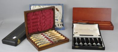 A cased Walker & Hall three piece carving set, a fruit set,