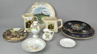 A collection of decorative plates, to include one with Faience, with three jugs and a vase,