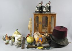 A mixed collection of assorted ceramics and other items to include; hats,