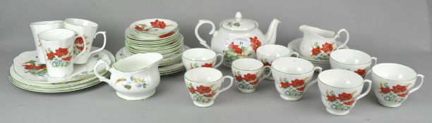 A Duchess 'Poppies' tea set to include teapot, creamer, plates cups and saucers.