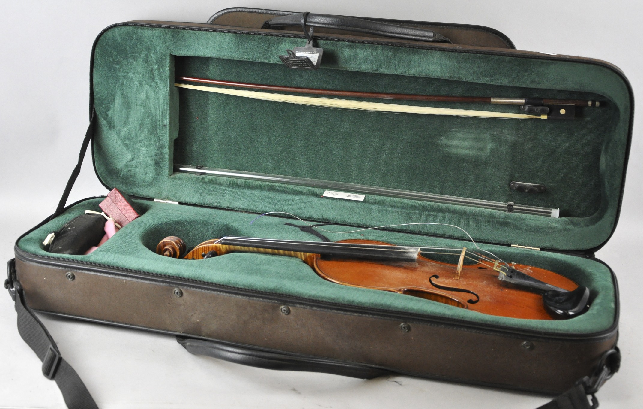 A Garrodus violin with bow in case. Measures; 58cm.