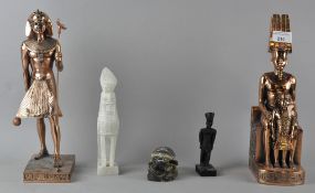 A collection of Egyptian figures, to include two copper Pharaohs, 31cm high, an alabaster Horus,