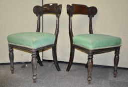 A pair of Regency mahogany dining / side chairs having upholstered seats. Measures; 87cm high.