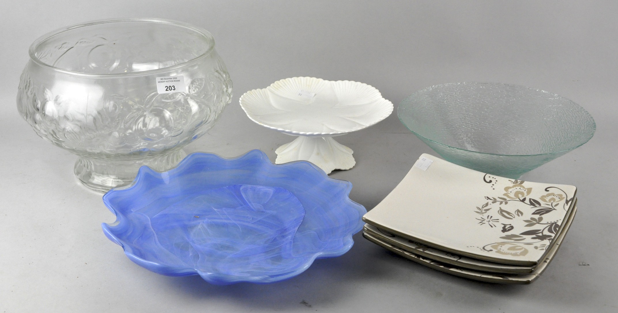 A blue glass bowl,a pressed glass punch bowl,