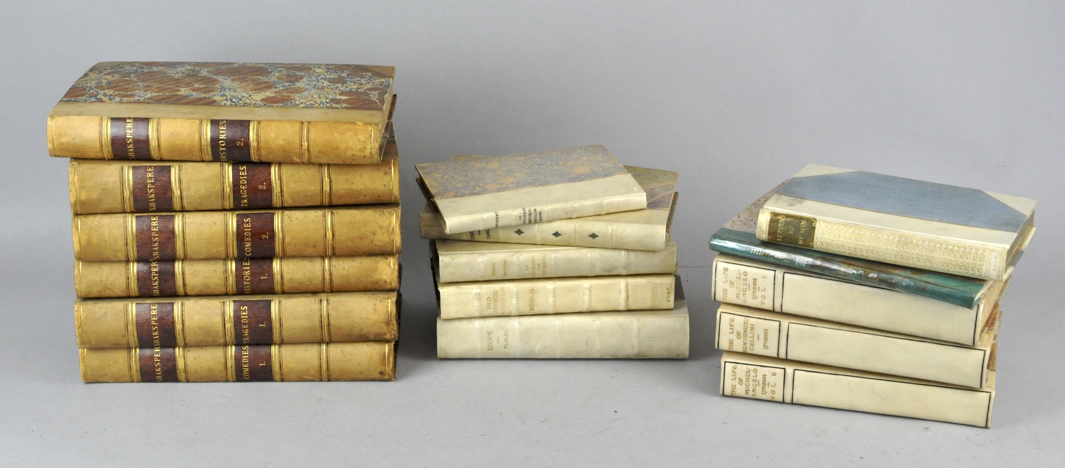 A collection of assorted leather spined books