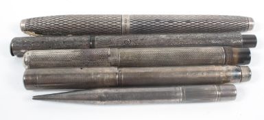 A silver bodied 'Battle Axe' fountain pen, with engraved floral decoration, inscribed,