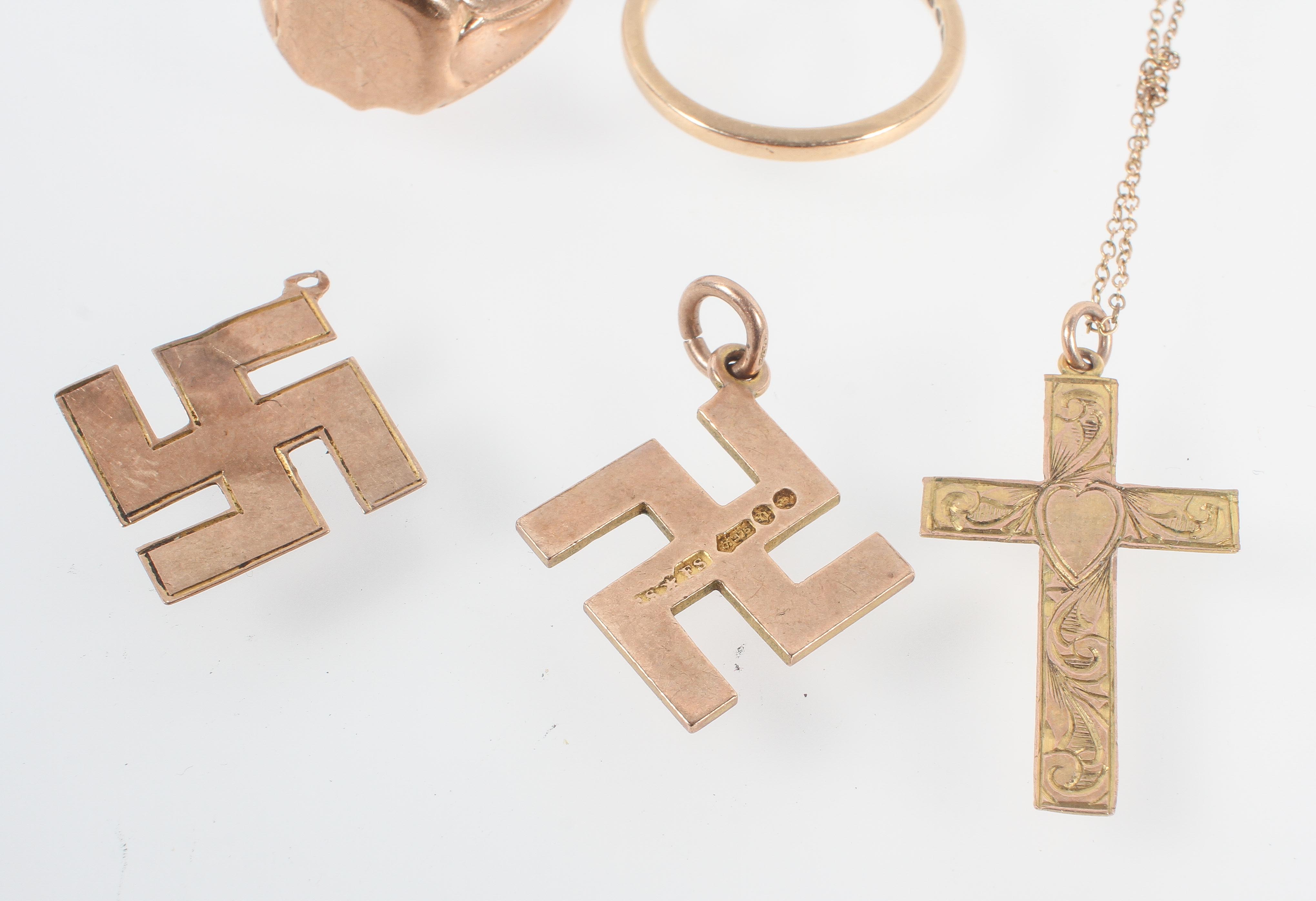 A collection of jewellery to include: Three rings; One brooch; Two pendants; One cross and chain. - Image 2 of 3