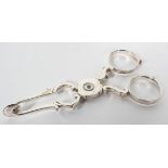 A pair of 18th century silver scissor action sugar nips, no hallmark or date letter,