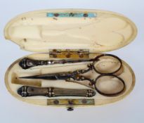 A Victorian ivory Etui, of oval form, with accessories, lacking thimble,