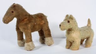 A Merrythought dog and a horse, early 20th century, the dog with label to paw,