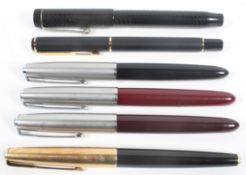 A collection of Parker fountain pens,