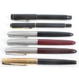 A collection of Parker fountain pens,