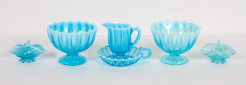 A collection of Davidson's blue 'Pearline' press moulded glass, late 19th century,